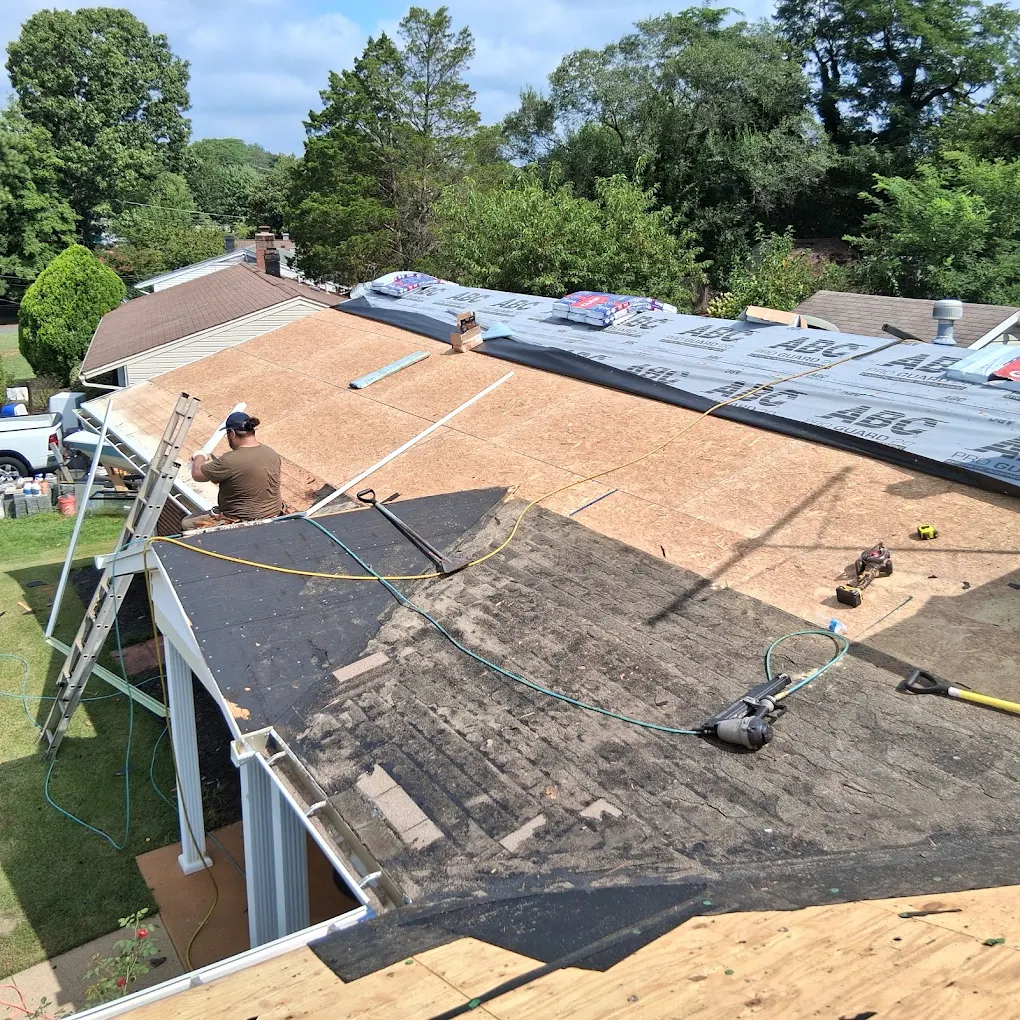 J Castillo Construction installing underlayment on a Herndon VA roof